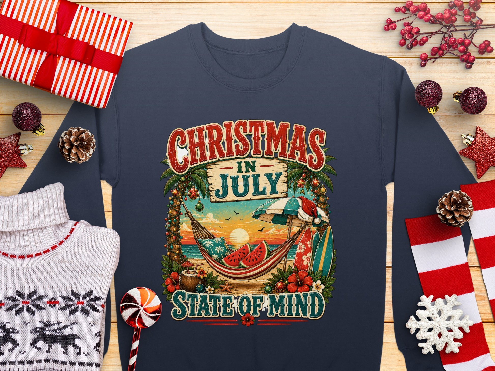 Christmas in July State of Mind graphic on a navy sweatshirt with beach scene.