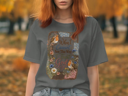 Grey t-shirt with floral and bird graphic and text "When I Cannot See The Way I Trust God".
