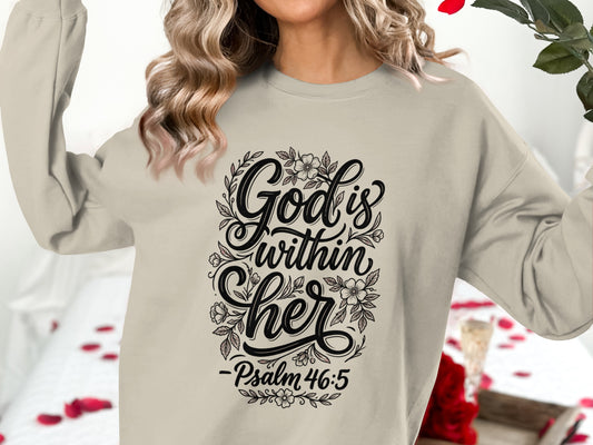 Cream sweatshirt with floral design and "God is within her" text.