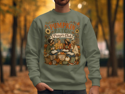 Green sweatshirt featuring "Pumpkin Patch Prayer Club" graphic with autumnal motifs.