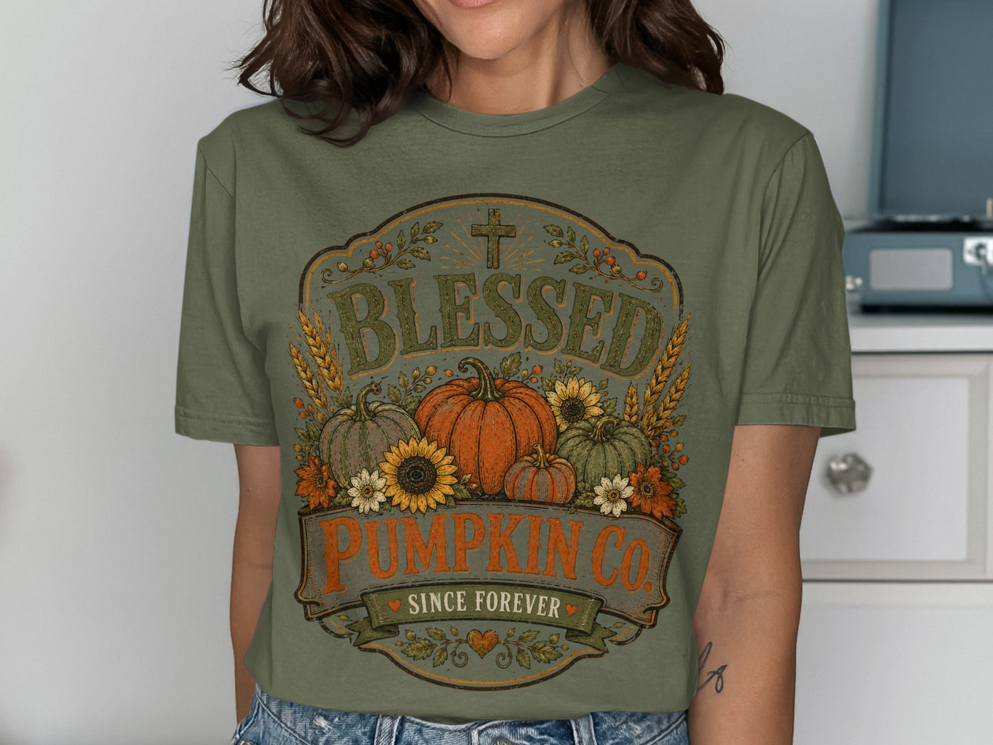 Olive green t-shirt with "Blessed Pumpkin Co. Since Forever" graphic.