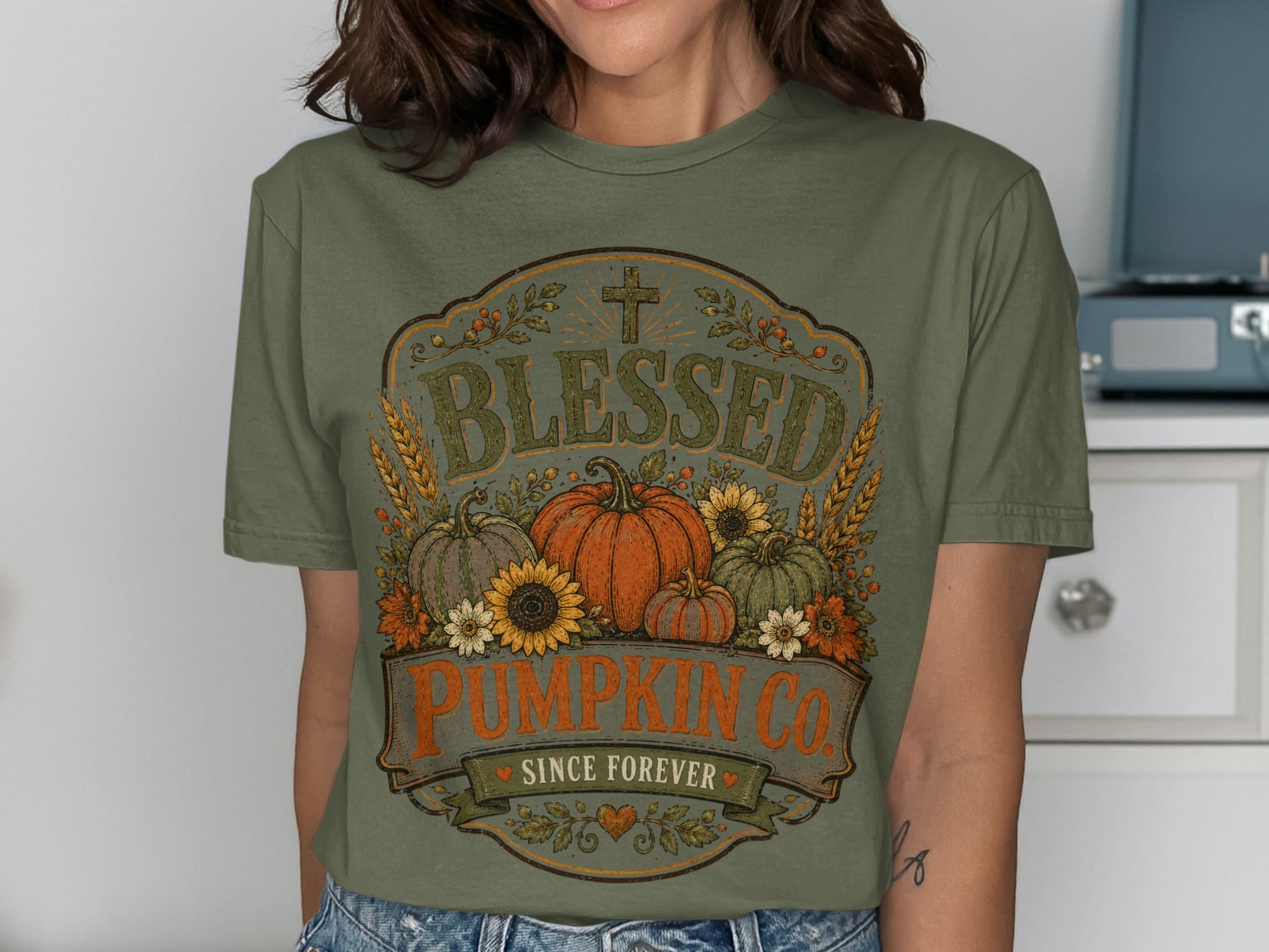 Olive green t-shirt with "Blessed Pumpkin Co. Since Forever" graphic.