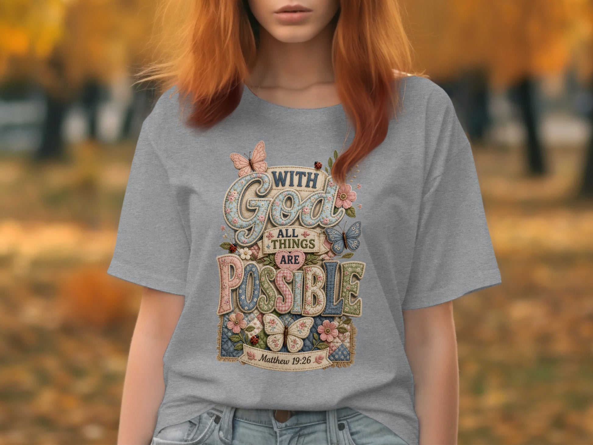 Gray t-shirt with "With God All Things Are Possible" and floral butterflies.