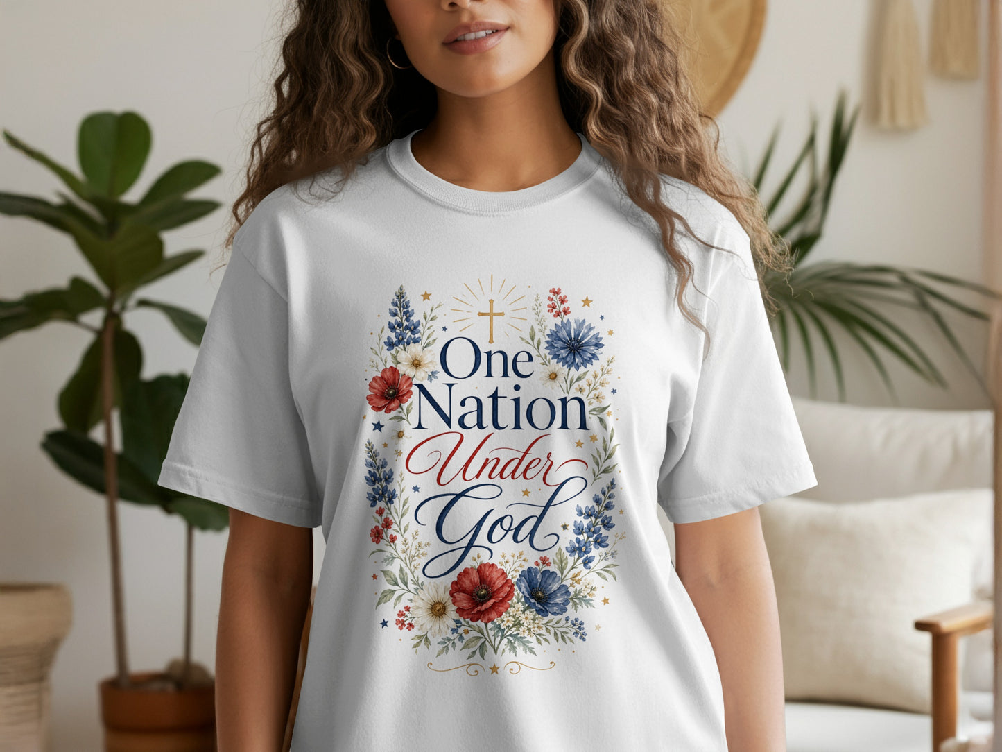 White t-shirt with "One Nation Under God" text and floral design.