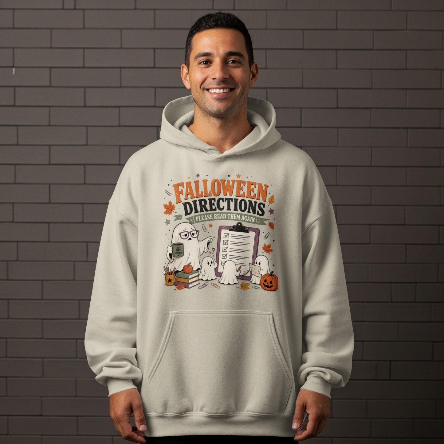 Falloween Directions graphic with ghosts, checklist, coffee, and books on a light hoodie.