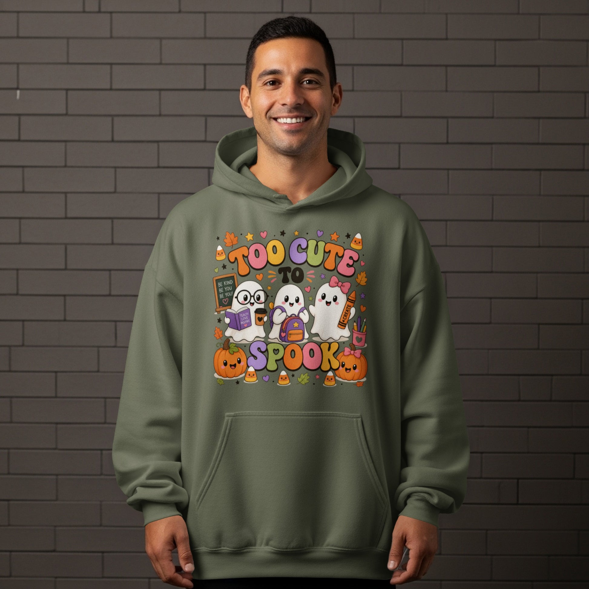 Green hoodie with "Too Cute To Spook" text and cute Halloween ghosts.
