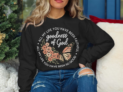 Black sweatshirt with "All my life you have been faithful, goodness of God" and butterfly graphic.