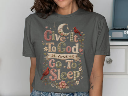 T-shirt with "Give It To God and Go To Sleep" text, moon, birds, and flowers.