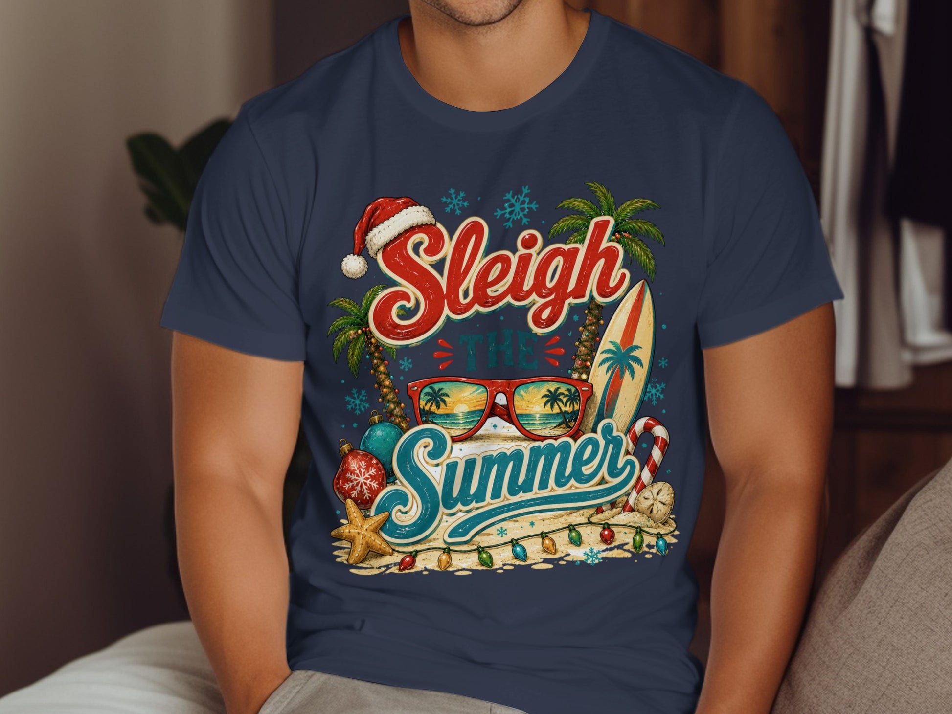 T-shirt with "Sleigh the Summer" text, Santa hat, surfboard, and beach scene.