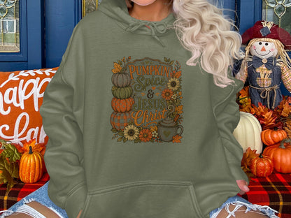 Green hoodie with "Pumpkin Spice & Jesus Christ" text and fall graphics.