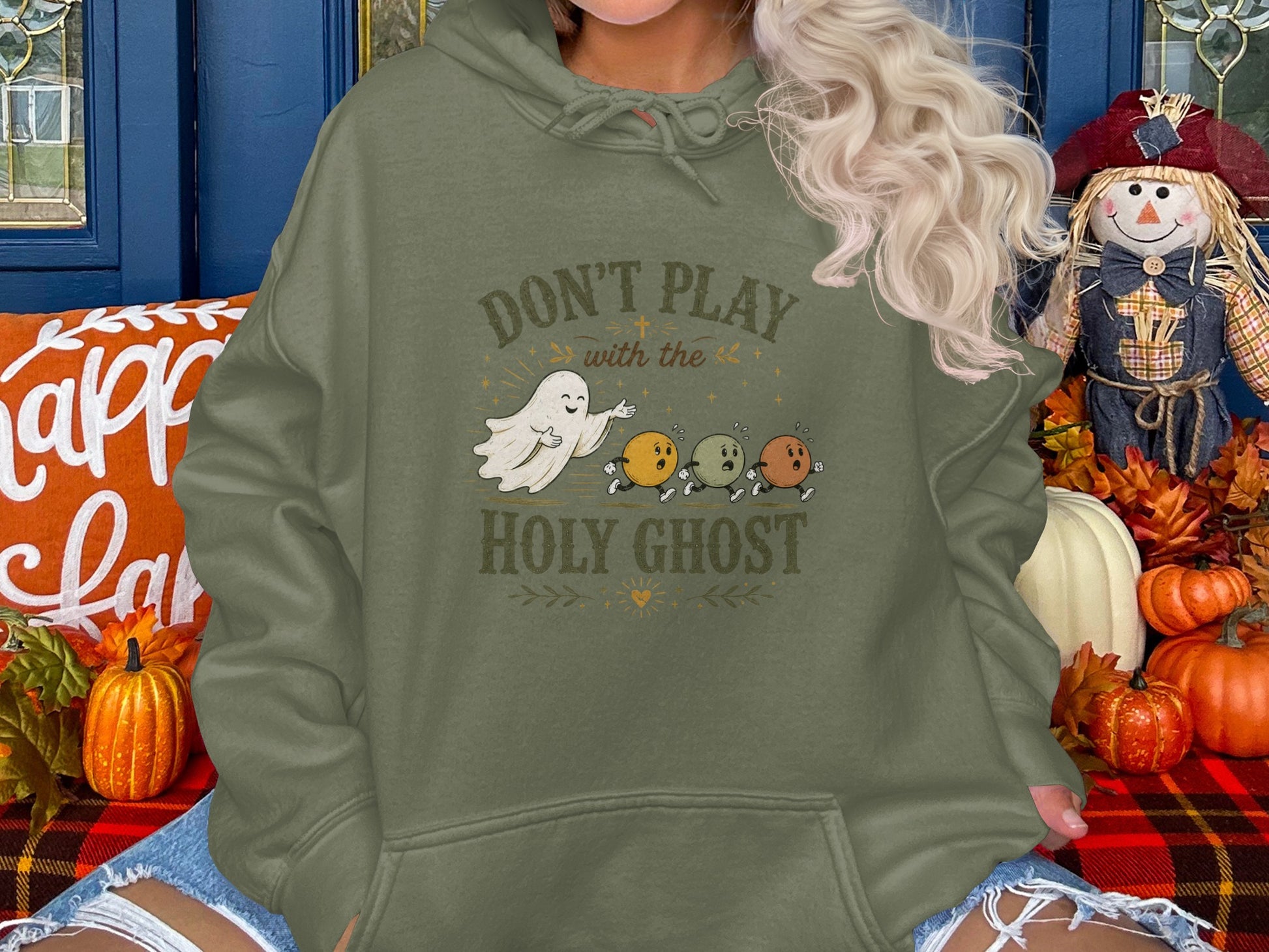 Hoodie with ghost and pumpkins saying "Don't Play with the Holy Ghost."