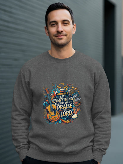 Man wearing a gray sweatshirt with a colorful musical instrument graphic and psalm text.