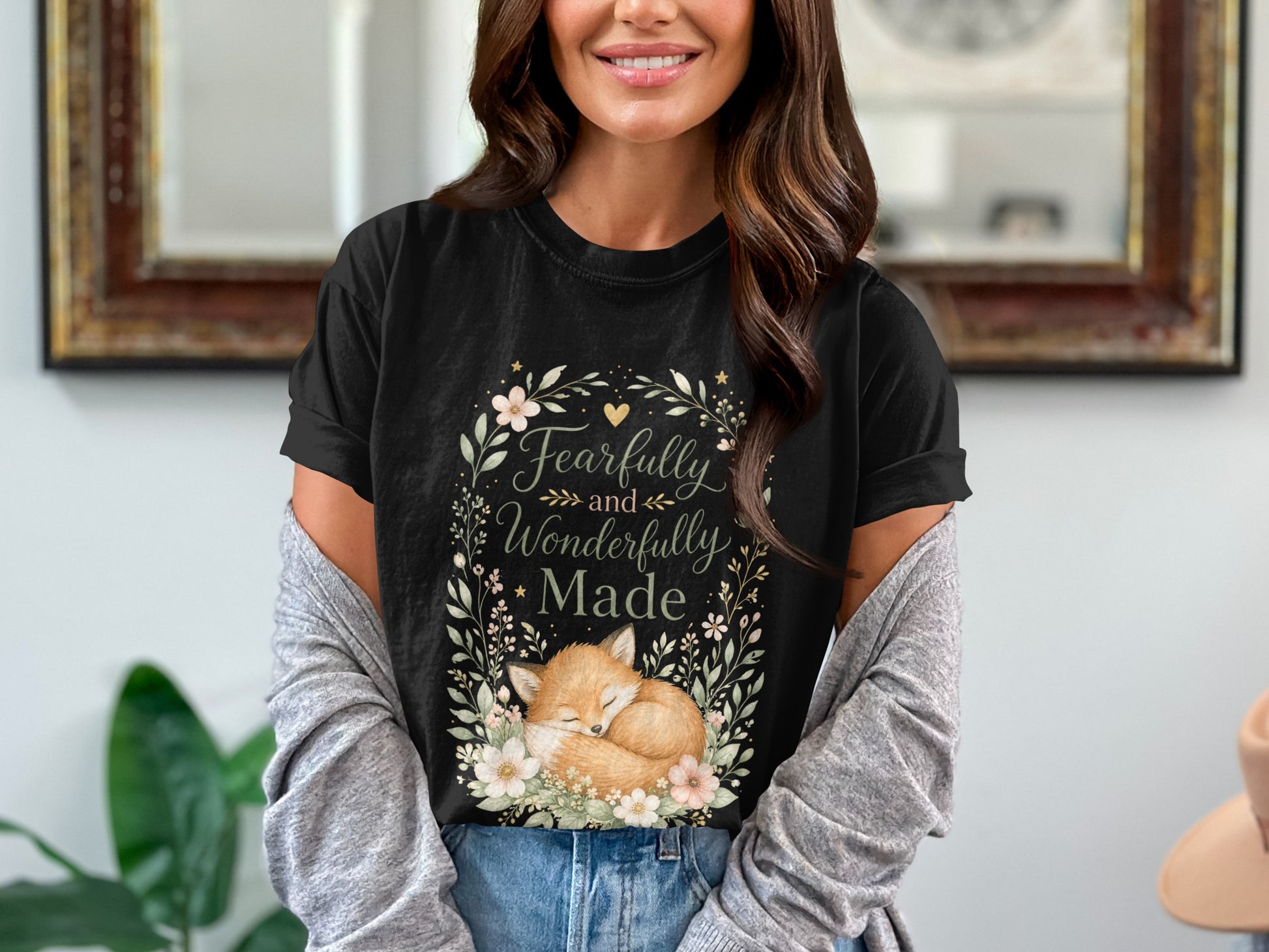 Black t-shirt with a sleeping fox and the text "Fearfully and Wonderfully Made."