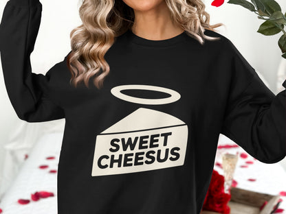 Black sweatshirt with "SWEET CHEESUS" text and a halo graphic.