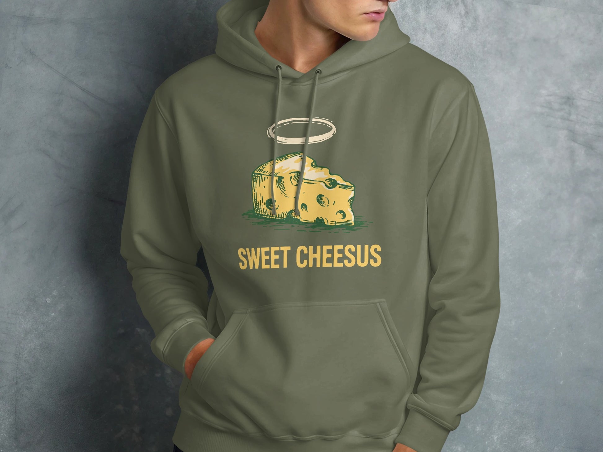Green hoodie with a slice of Swiss cheese and "Sweet Cheesus" text.