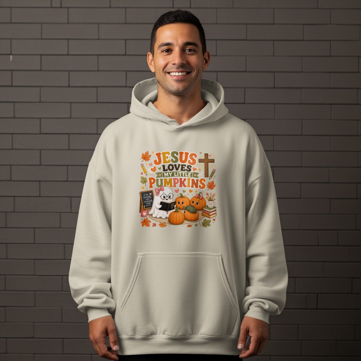 Light beige hoodie with "Jesus Loves My Little Pumpkins" graphic and Halloween motifs.