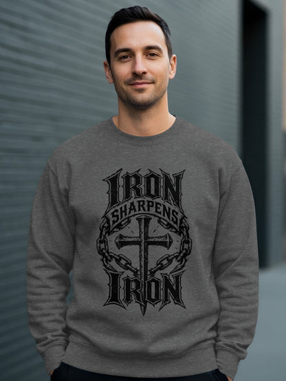 Man wearing gray sweatshirt with "Iron Sharpens Iron" text and cross design.