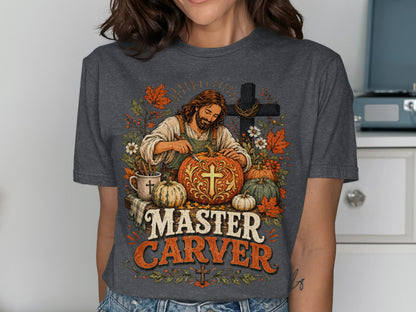 Jesus carving a pumpkin with "Master Carver" text.
