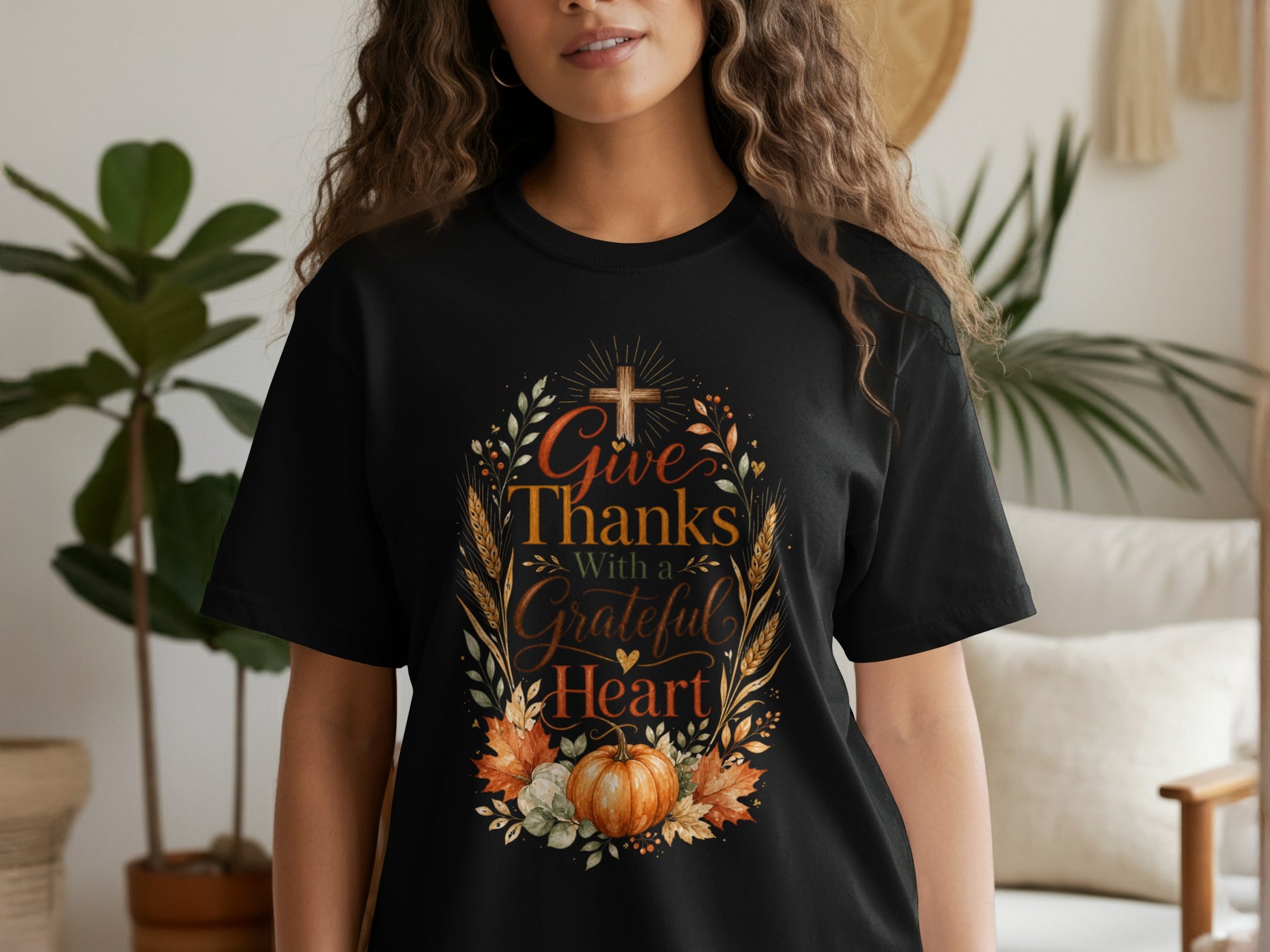 Black t-shirt with Thanksgiving graphic featuring "Give Thanks With a Grateful Heart" text.