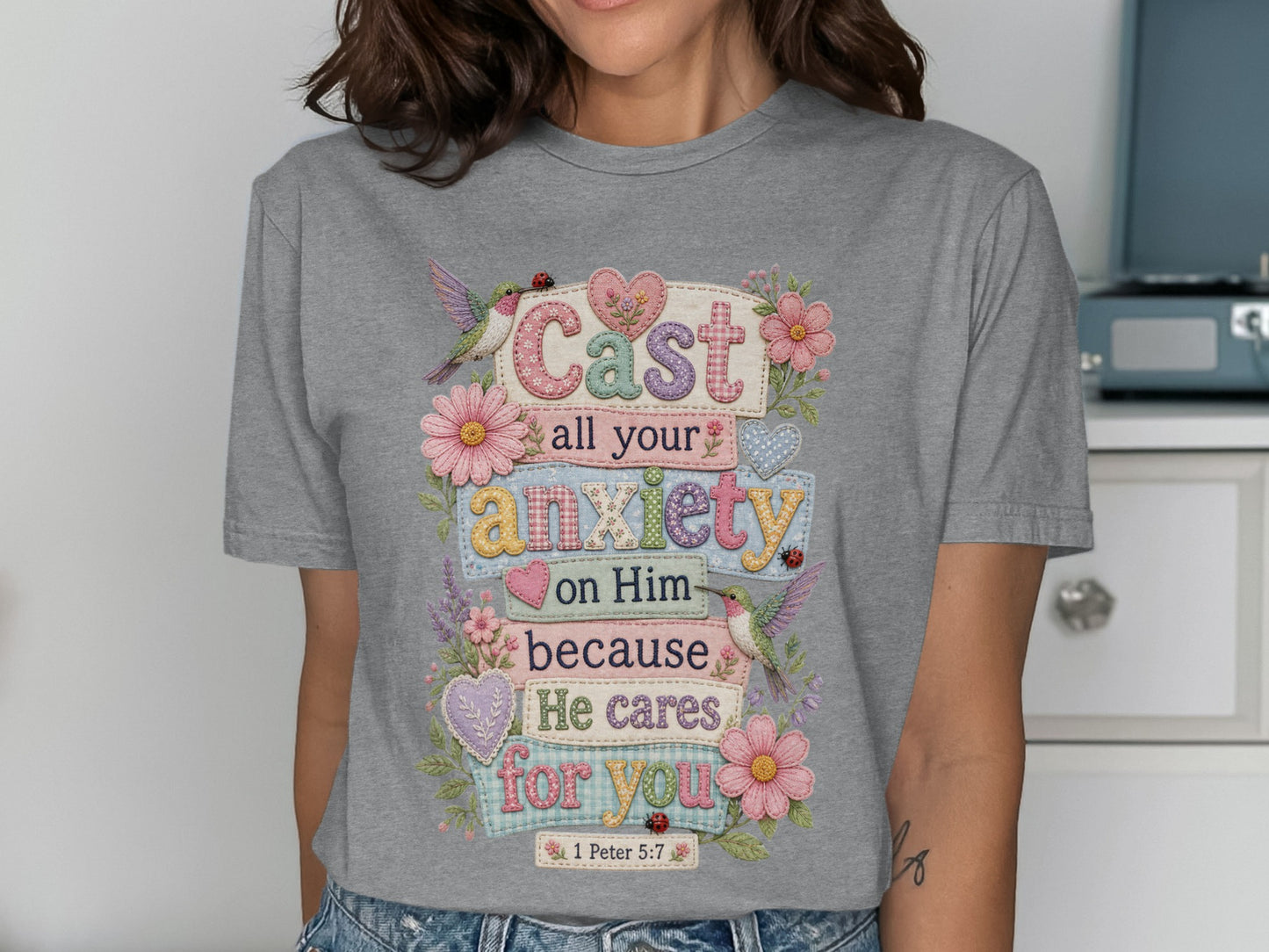 Gray t-shirt with "Cast all your anxiety on Him because He cares for you 1 Peter 5:7" text.