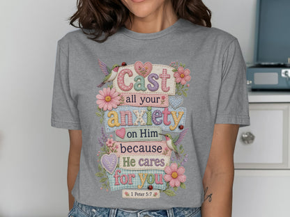 Gray t-shirt with "Cast all your anxiety on Him because He cares for you 1 Peter 5:7" text.