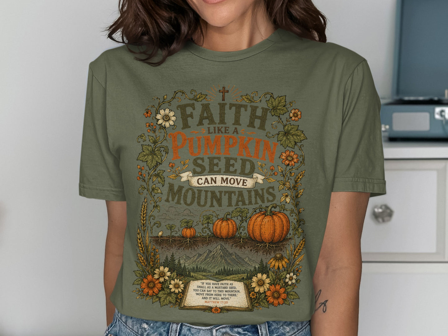 T-shirt with "Faith like a pumpkin seed can move mountains" and Bible verse.
