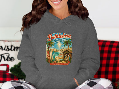 Bethlehem Beach Club logo with palm trees, surfboards, a nativity scene, and text.