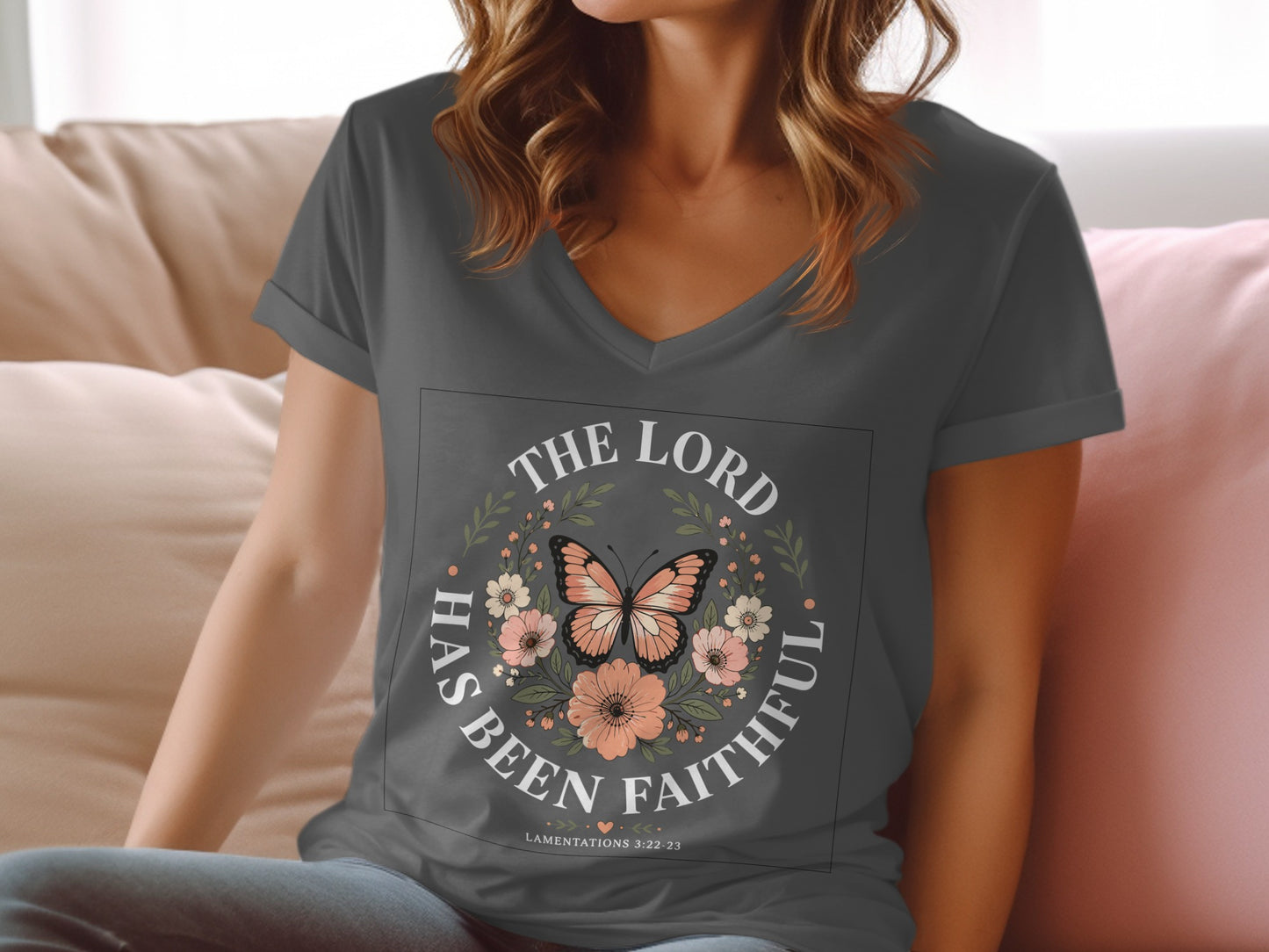 Dark grey V-neck t-shirt with floral wreath and "The Lord Has Been Faithful" text.