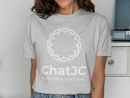 Light gray t-shirt with white thorny crown and "ChatJC No Prompts. Just Praise." text.