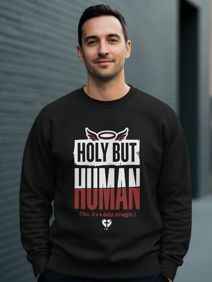 Black sweatshirt with "Holy But Human (Yes, it's a daily struggle)" graphic.