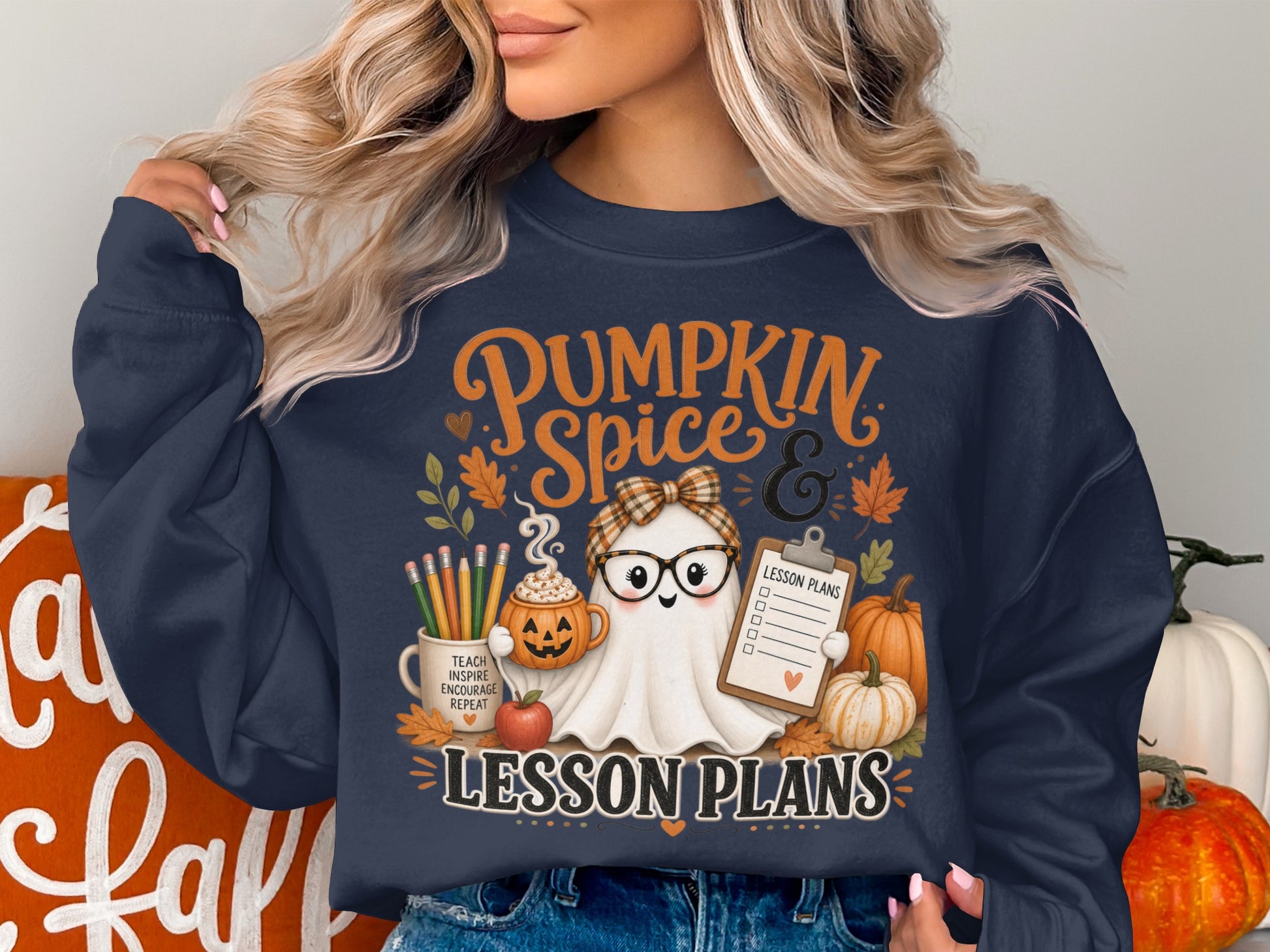Navy sweatshirt with "Pumpkin Spice & Lesson Plans" and a cute ghost illustration.