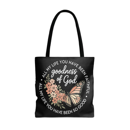 Black tote bag with butterfly and floral design and "goodness of God" text.