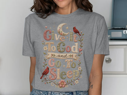 Gray t-shirt with "Give It To God and Go To Sleep" text and bird/floral accents.