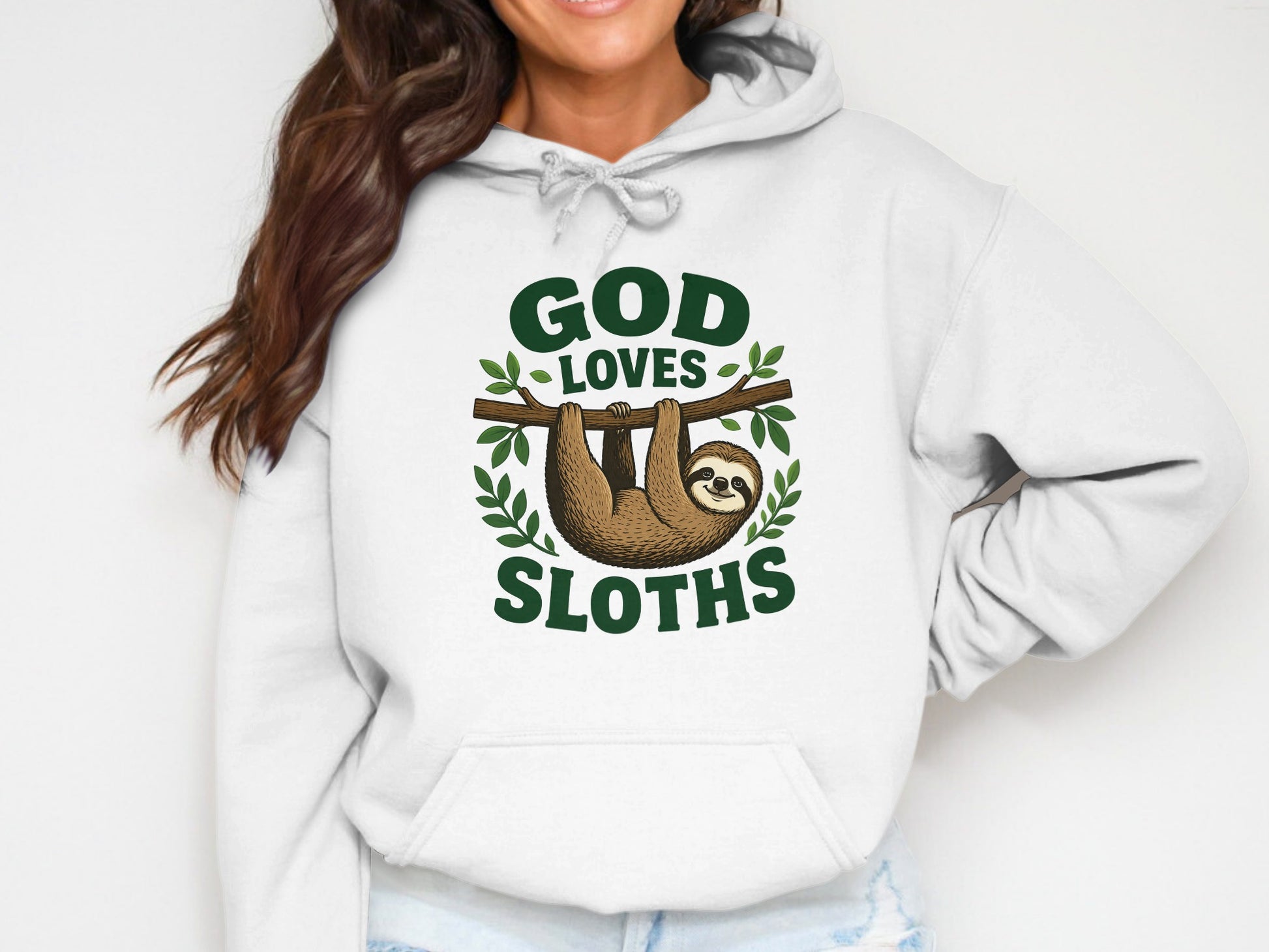 White hoodie with "God Loves Sloths" text and a sloth hanging from a branch.