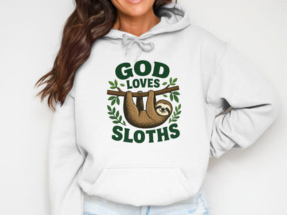 White hoodie with "God Loves Sloths" text and a sloth hanging from a branch.