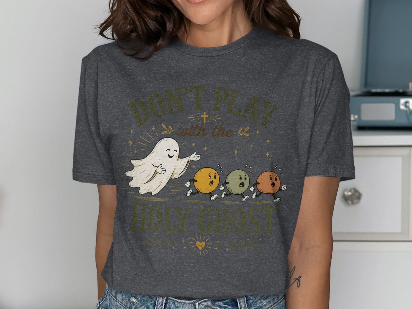 T-shirt with ghosts and text "Don't Play with the Holy Ghost".