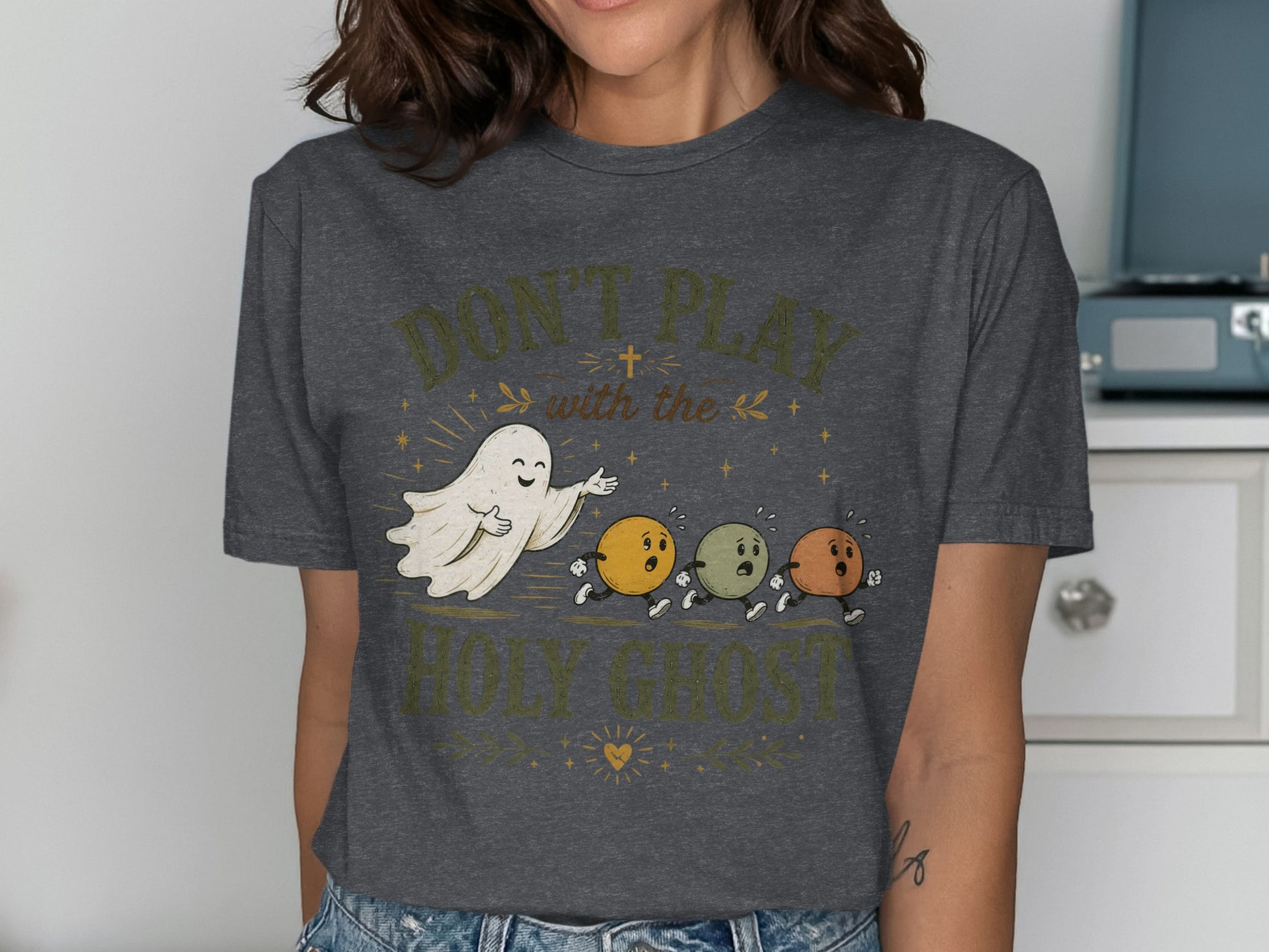 T-shirt with ghosts and text "Don't Play with the Holy Ghost".