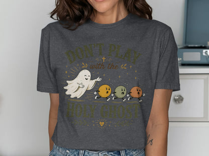 T-shirt with ghosts and text "Don't Play with the Holy Ghost".