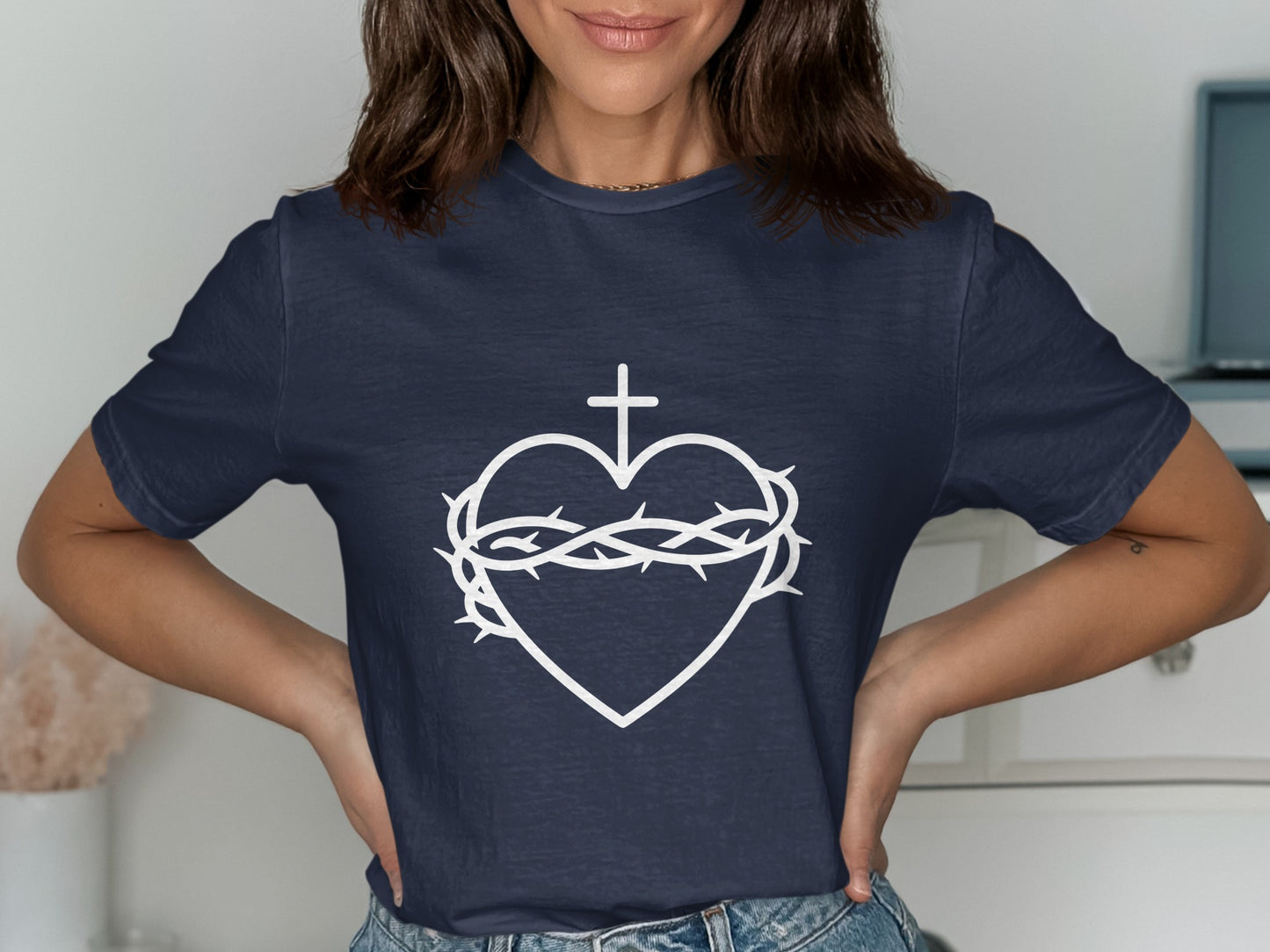 Navy t-shirt with a white Sacred Heart of Jesus graphic.