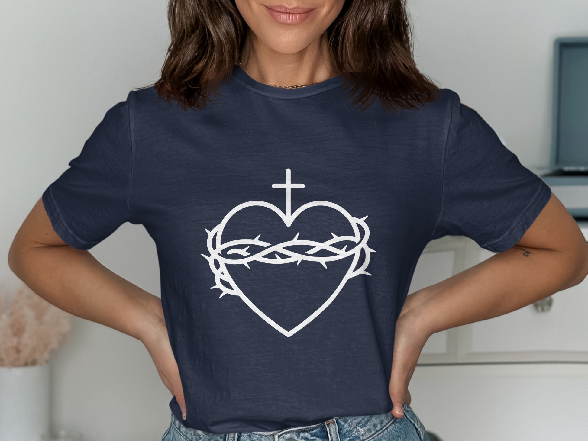 Navy t-shirt with a white Sacred Heart of Jesus graphic.