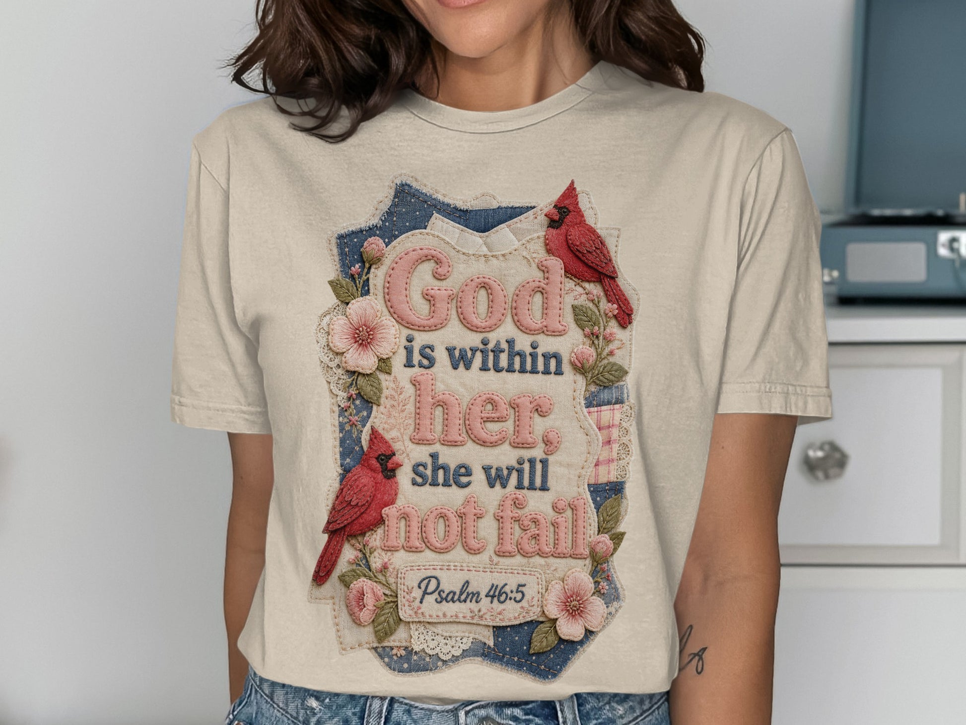 T-shirt with "God is within her, she will not fail" and Psalm 46:5.