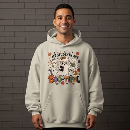 Cream hoodie with "My Students Are Boo-tiful" text and cute ghosts holding school supplies.