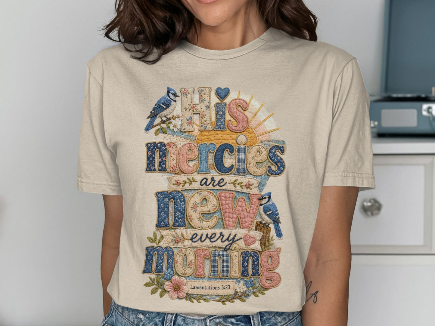 Beige t-shirt with "His Mercies Are New Every Morning" text and bluebirds.